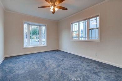 Welcome to this beautifully renovated Spanish-style home