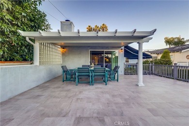 Welcome to this beautifully renovated Spanish-style home