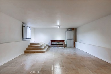 Welcome to this beautifully renovated Spanish-style home