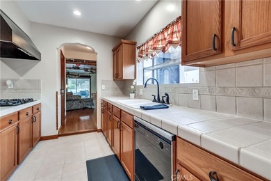 Welcome to this beautifully renovated Spanish-style home