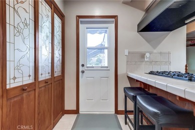 Welcome to this beautifully renovated Spanish-style home