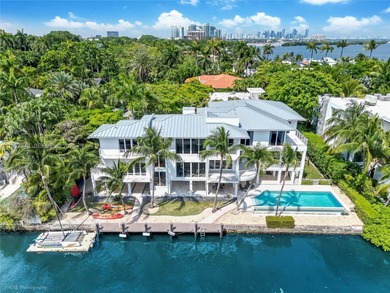 A private tropical oasis--waterfront estate with 150 FT of water