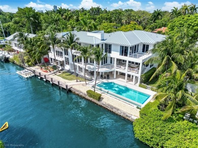 A private tropical oasis--waterfront estate with 150 FT of water