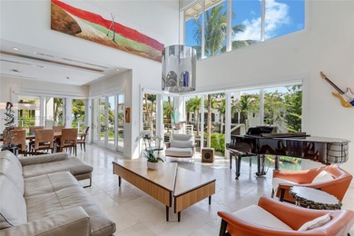 A private tropical oasis--waterfront estate with 150 FT of water