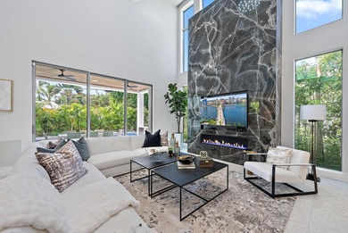 A vision of modern Palm Beach luxury, this brand-new 2025