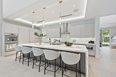 A vision of modern Palm Beach luxury, this brand-new 2025