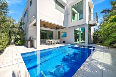 A vision of modern Palm Beach luxury, this brand-new 2025