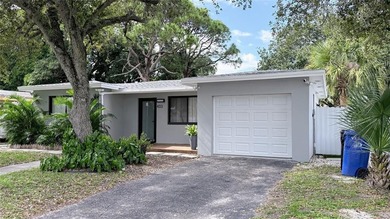 Welcome to a fully remodeled gem just minutes from the beach and