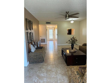 Elevated living meets total convenience in this charming