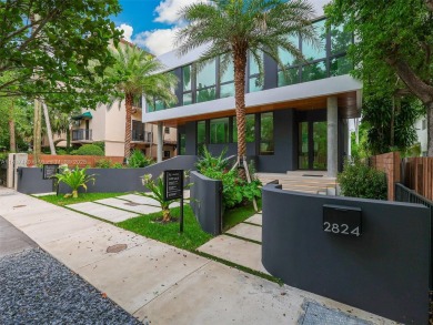 This brand new, luxurious 3 story townhome is perfectly situated