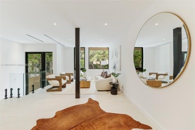 This brand new, luxurious 3 story townhome is perfectly situated