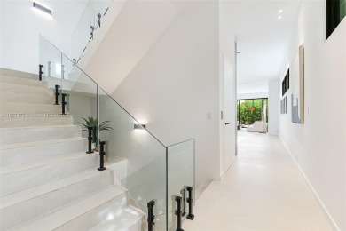 This brand new, luxurious 3 story townhome is perfectly situated