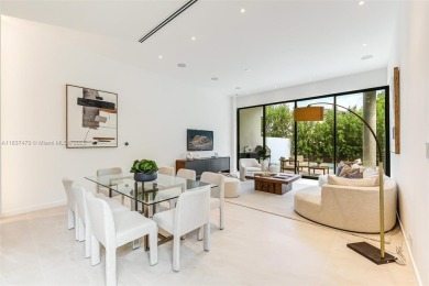 This brand new, luxurious 3 story townhome is perfectly situated