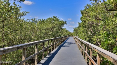 Nestled in the heart of Ponce Inlet, this luxurious condo