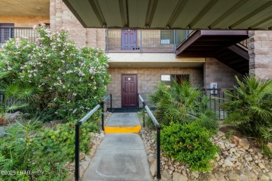 Welcome to the gated community of Queen's Bay Resort &