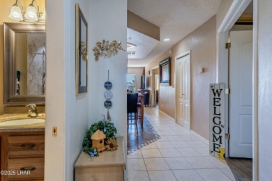 Welcome to the gated community of Queen's Bay Resort &