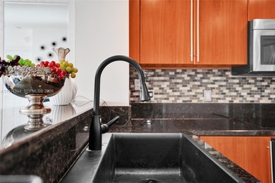 Live in the heart of downtown West Palm Beach in this