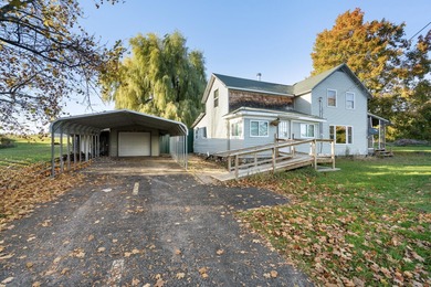 Just south of Cheboygan, this charming 4-bedroom, 2-bath