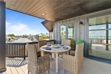 A rare point-lot estate on Key Allegro, blending resort-caliber