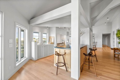 A rare point-lot estate on Key Allegro, blending resort-caliber