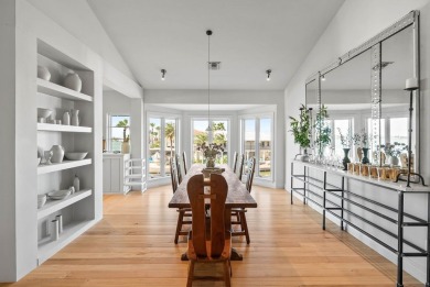 A rare point-lot estate on Key Allegro, blending resort-caliber