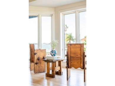 A rare point-lot estate on Key Allegro, blending resort-caliber