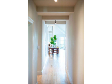 A rare point-lot estate on Key Allegro, blending resort-caliber