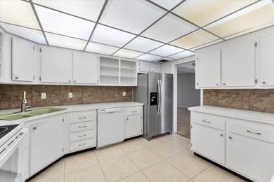 Opportunity in Prime Boca Raton Location! This top-floor corner