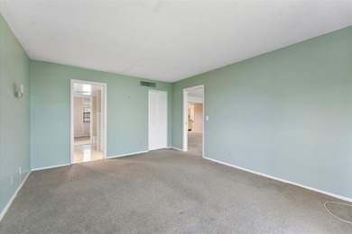 Opportunity in Prime Boca Raton Location! This top-floor corner