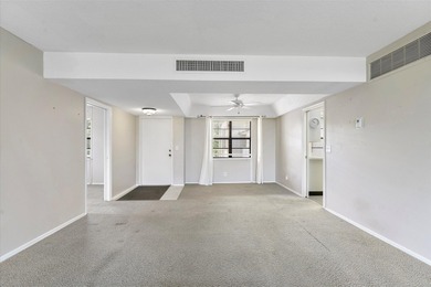 Opportunity in Prime Boca Raton Location! This top-floor corner