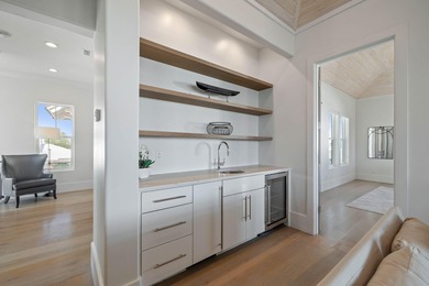 Tucked within the quiet coastal enclave of Gulf Shore Manor