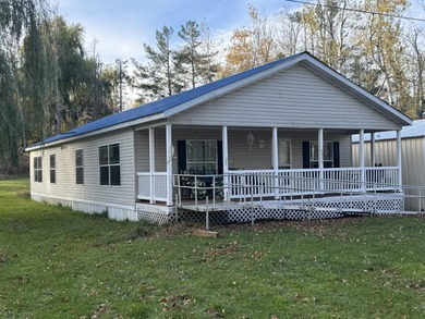 Discover the perfect Northern Michigan retreat at 3899 Miami