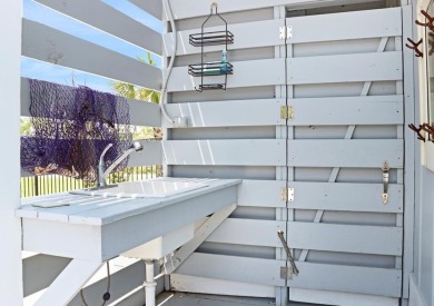 Discover your dream beach escape in this exquisite turn-key