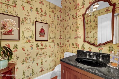 Gorgeous custom-built brick home on a 0.71 acre lot on fairway