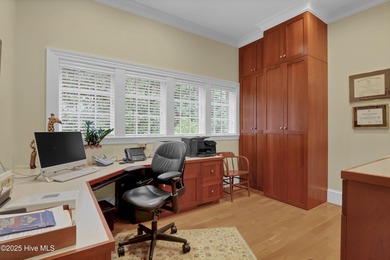 Gorgeous custom-built brick home on a 0.71 acre lot on fairway