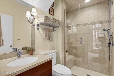 Gorgeous custom-built brick home on a 0.71 acre lot on fairway