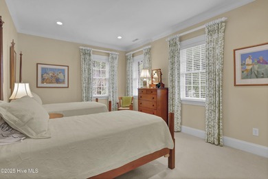 Gorgeous custom-built brick home on a 0.71 acre lot on fairway