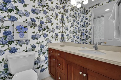 Gorgeous custom-built brick home on a 0.71 acre lot on fairway