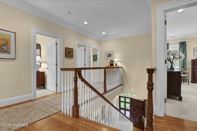 Gorgeous custom-built brick home on a 0.71 acre lot on fairway