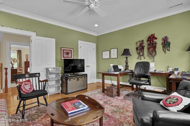 Gorgeous custom-built brick home on a 0.71 acre lot on fairway