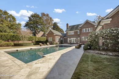 Gorgeous custom-built brick home on a 0.71 acre lot on fairway