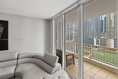 Experience the privacy and charm of Brickell Key in this 1 bed /