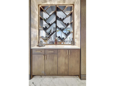 Ultra-Modern and refined describes this unrivaled two story, two