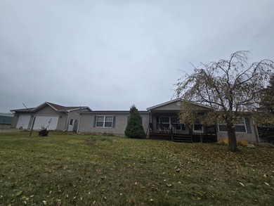 20+/- Acres...Large, well-cared-for home with three bedrooms