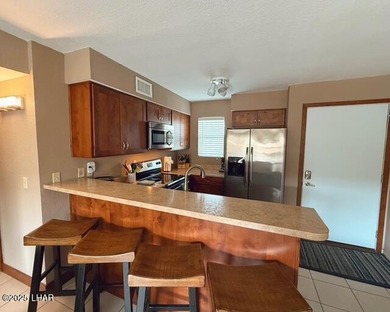 Welcome home to your quiet Xanadu resort-like condo with a