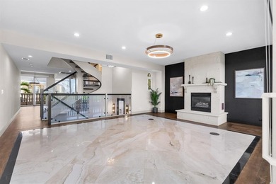WELCOME HOME TO YOUR PROFESSIONALLY DESIGNED OASIS IN POPULAR