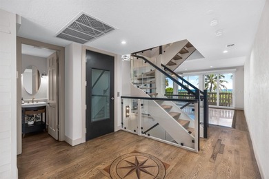 WELCOME HOME TO YOUR PROFESSIONALLY DESIGNED OASIS IN POPULAR