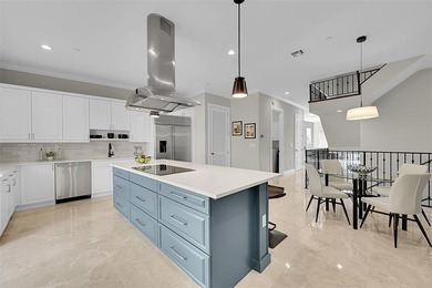 Stunning, recently updated, furnished 4-story luxury townhome