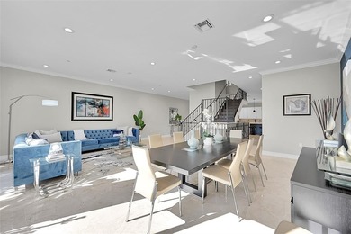 Stunning, recently updated, furnished 4-story luxury townhome