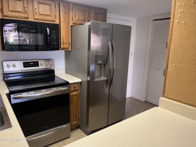 This lovely 2 bedroom condo has its own private patio with